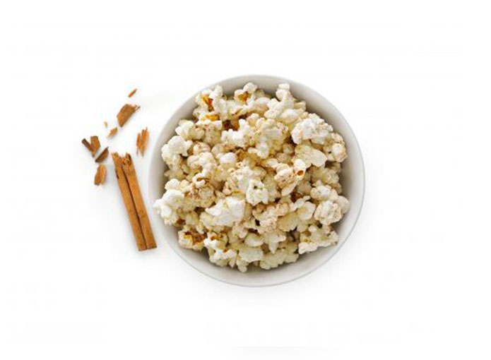 Sweet popcorn with sugar and cinnamon 