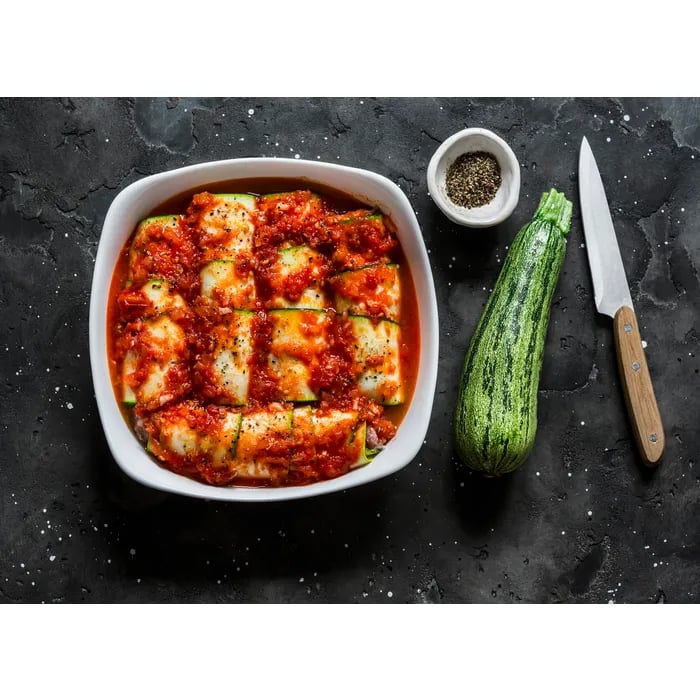 Courgette, hake and shrimp ravioli in a bouillon