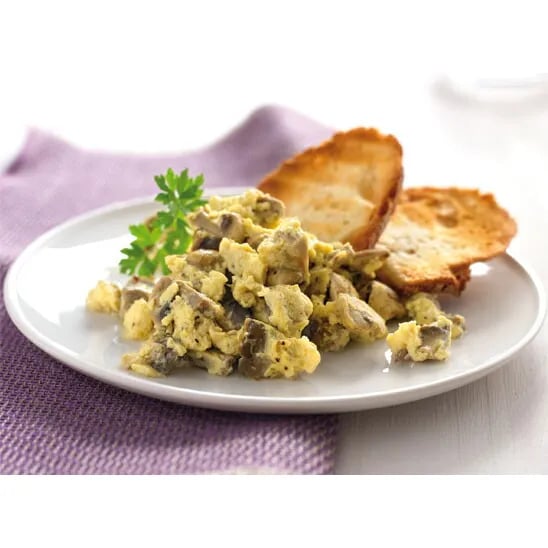 Scrambled eggs with mushrooms on toast